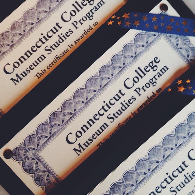 Three certificates from Connecticut Colleges Museum Studies Program are partially visible, stacked together. One has a blue and gold star-patterned ribbon attached.